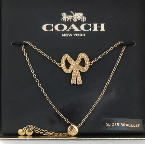Coach Bow Tie Gold and Silver Pendant Slider Bracelet - Picture 2 of 4